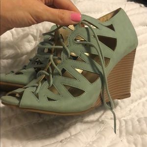 Caged laced up wedges